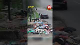 2男路边丢垃圾遭“远端执法” 当场认栽乖乖捡回