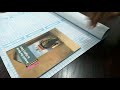 Wrapping book using self adhesive sheet