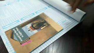 Wrapping book using self adhesive sheet.