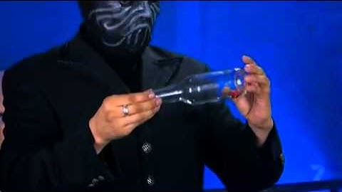 How to put a coin in a bottle