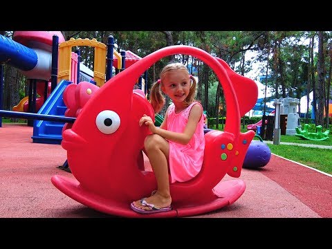 polina-plays-on-new-playground-for-kids.