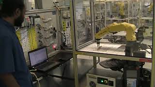 HENRY FORD COLLEGE ELECTRICAL TECHNOLOGY - FANUC ROBOT TO PLC INTERFACE OFFSET SHELLS
