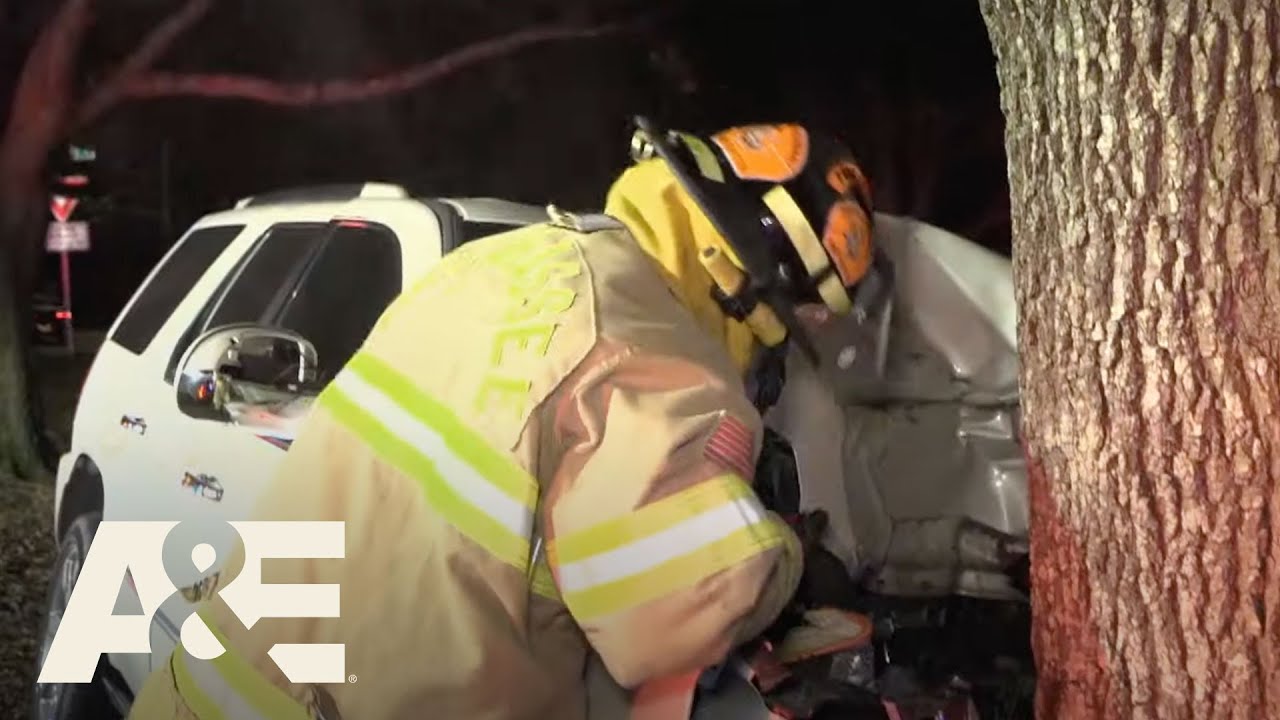 Live Rescue: Man Crashes Into a Tree (S3) | A&E - YouTube