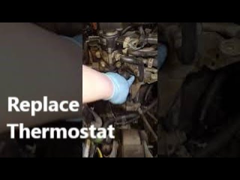 How to remove and replace a thermostat and thermostat housing - YouTube