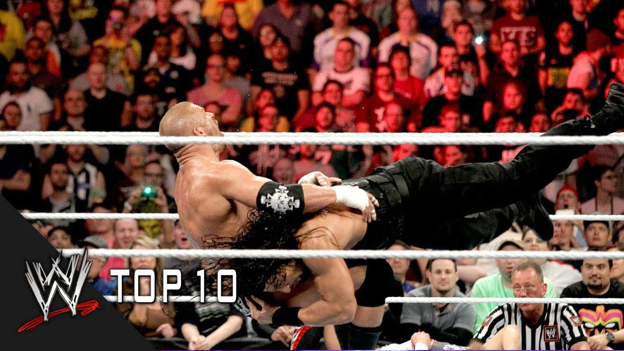 Roman Reigns' Greatest Spears - WWE Top 10