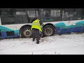 Man Films Bus Stuck in Snow while talking to workers Washington State 4K UHD 2021