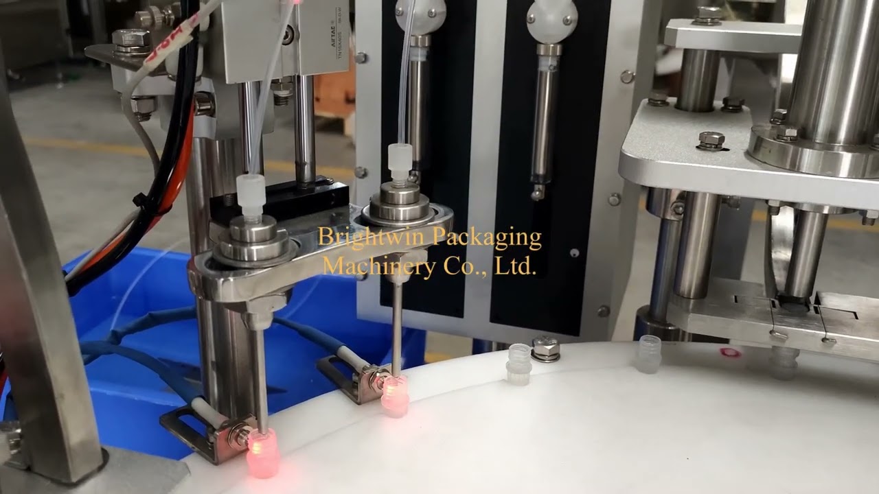 Biochemistry pharmaceutical reagent syringe 2 nozzles filling screw capping machine punching caps