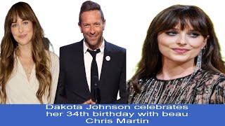 Dakota Johnson celebrates her 34th birthday with beau Chris Martin, at Los Angeles restaurant.