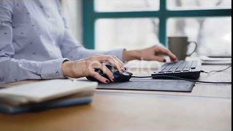 Woman Hand Typing on the Laptop Keyboard and Using Computer Mouse | Stock Footage - Envato elements