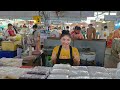 Buying dinner from a pattaya market thailand