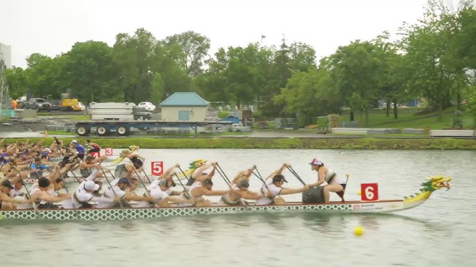 Dragon boat racing practice on a warm spring morning at Lake