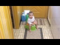 8 months old boy using potty