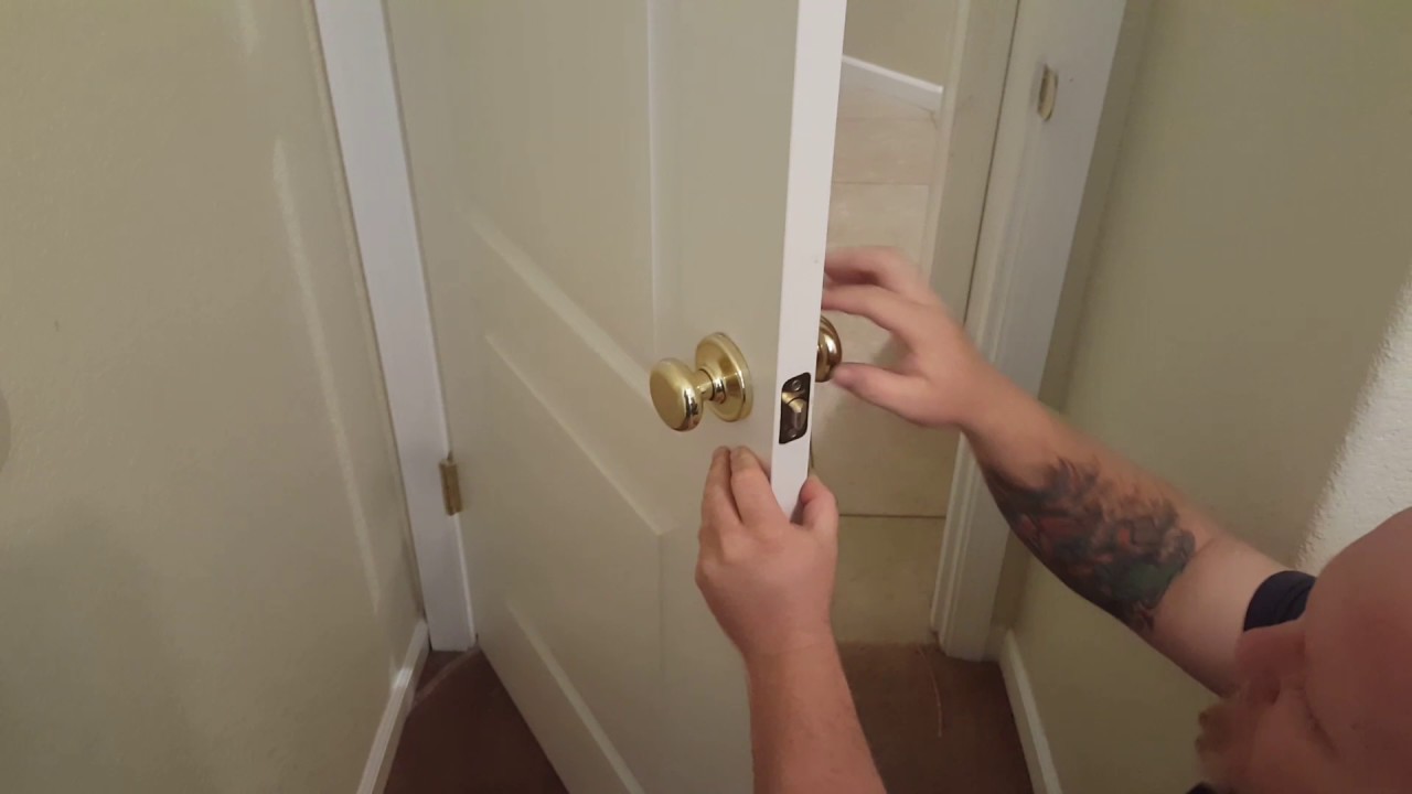 How to remove a door knob with no screws YouTube