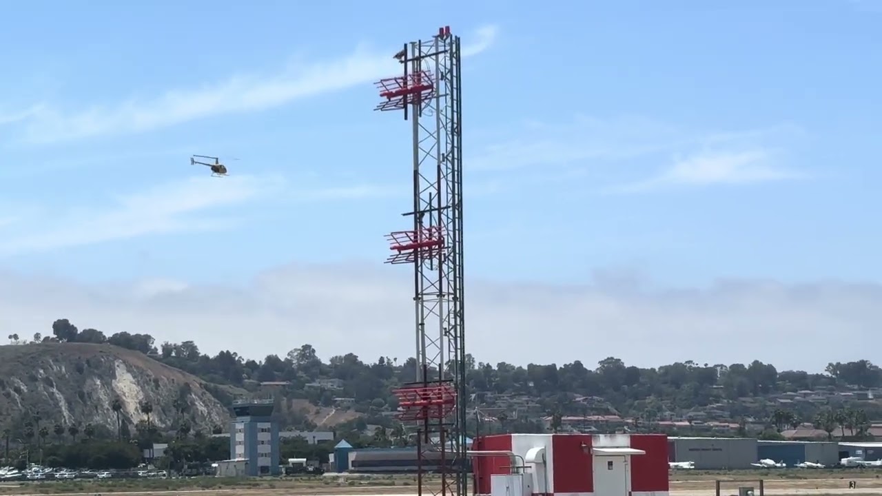 Robinson R22 Helicopter taking off from Torrance Airport 