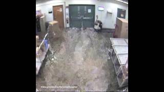 Water breaks down doors at Norwood Hospital during flood