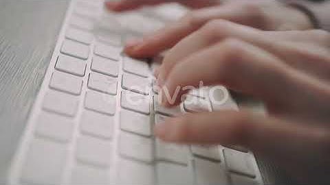 Hands Typing on Keyboard. Close Up of Female Hands Typing Keyboard Buttons | Stock Footage -