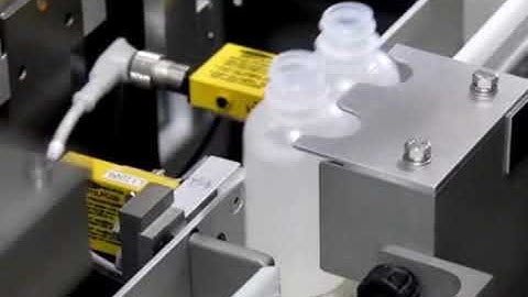 TaskMate Robotic Systems (R) Pick and Place for Inserting Reducers In Bottles