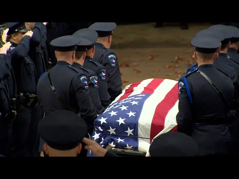 Body of Mesquite officer Richard Houston arrives to church ahead of ...