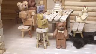 A dollhouse for a family of wooden bears. Full size patterns allow intermediate to advanced woodworkers to build this deluxe log 