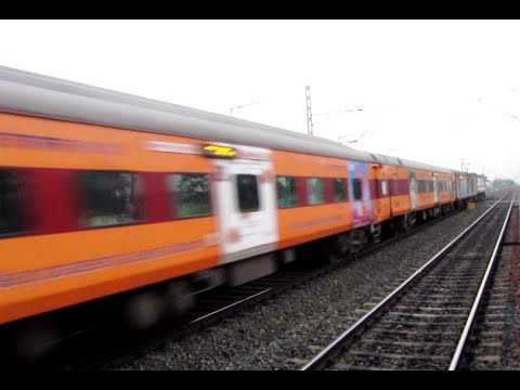 Rajdhani+Saraighat-speeding WDP4 & WAP7 in action