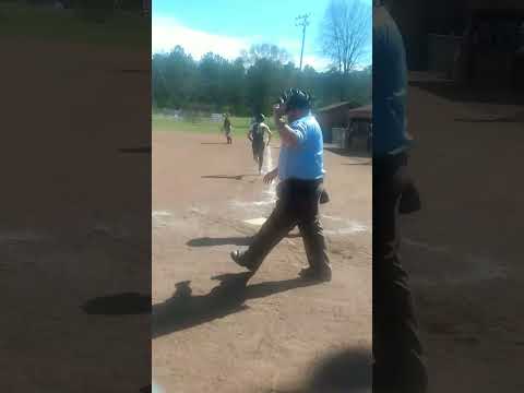 Locust Fork High School Softball  player getting a base hit during game vs. Southeastern Mar.23,2023