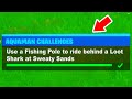 Aquaman Week 2 Challenges Fortnite - Use a Fishing Pole to ride behind a Loot Shark at Sweaty Sands