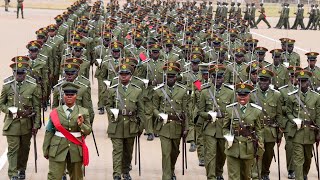 Gen Museveni watches brave UPDF soldiers match-past in the rain 🌧 Incredible display by cadets