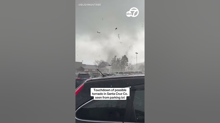 Touchdown of possible tornado in Santa Cruz Co. seen from parking lot