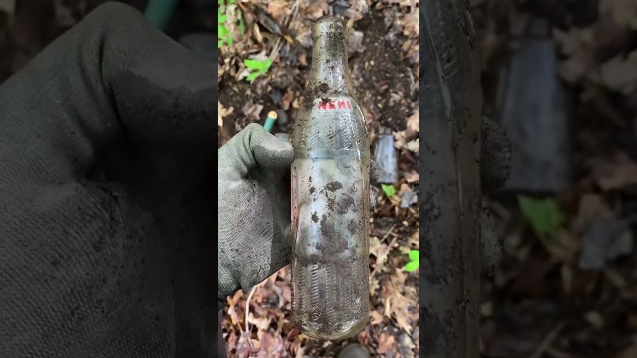 Broken 1950s Nehi soda bottle 