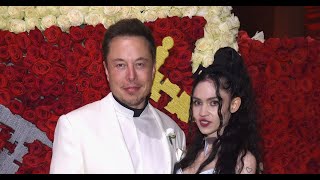 Elon Musk's girlfriend Grimes goes topless to show off giant alien back tattoo