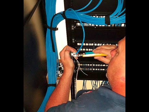 Wired Communications Terminating CAT 6 Cable at Patch Panel in Telecommunications Room (TR)