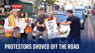 Just Stop Oil: Protesters shoved by members of the public during London slow march