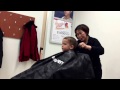 Zak Choumil getting a haircut at Hair Cuttery