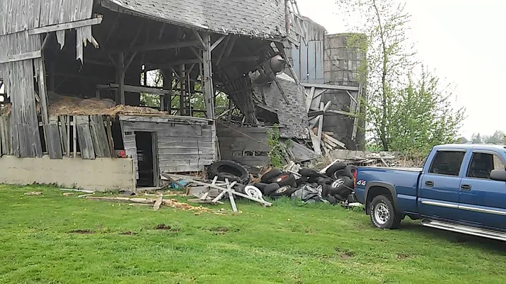 Pulling down a barn with a GMC Sierra SLT like a b...