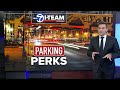 Government cars park in Chicago Loop tow zones while drivers receive tickets
