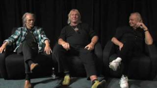 Steve Howe, Chris Squire and Alan White of Yes  Capes