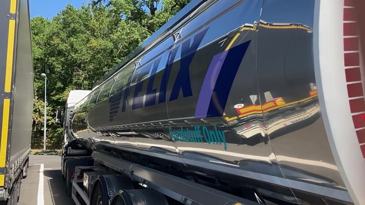 Me touring a big shiny tanker truck in France with a food grade tanker 
