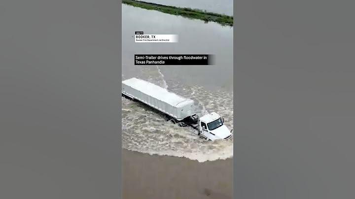Texas truck plows through flooding!