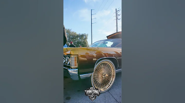 Kandy painted 71 donk on gold wire wheels