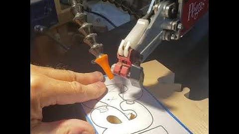 Pegas scroll saw- scrolling a name puzzle.