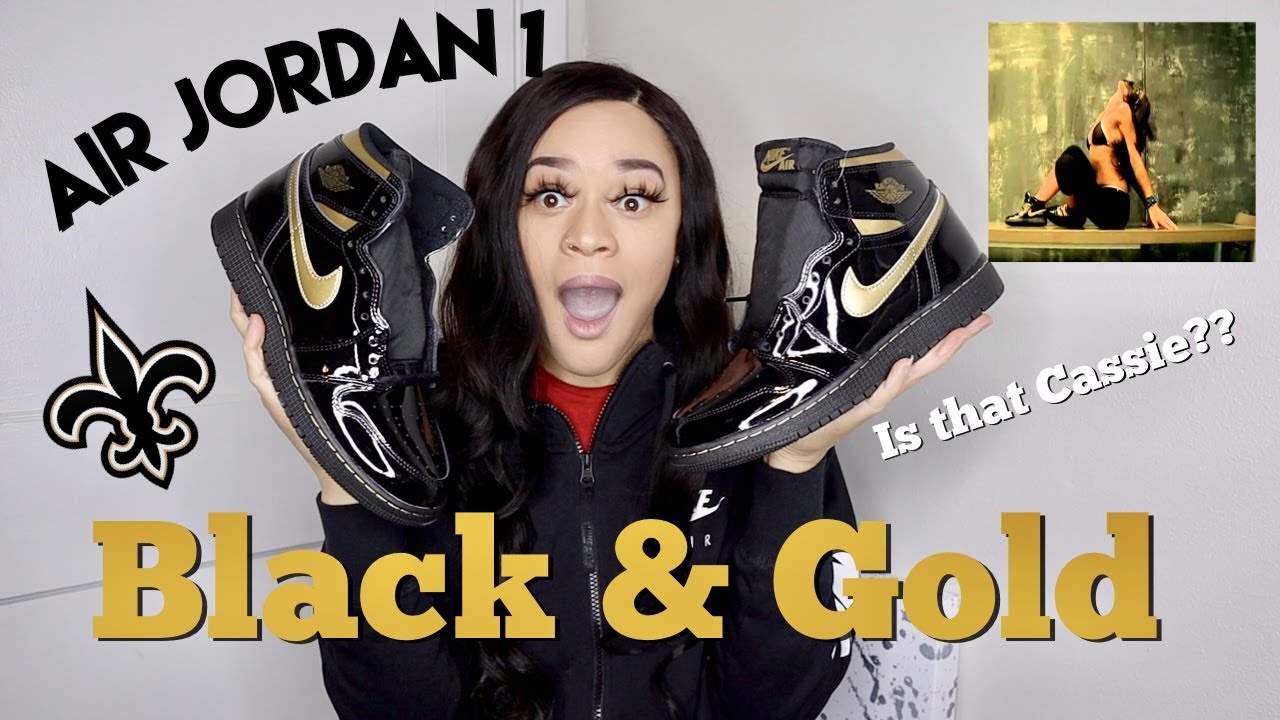 girl jordans black and gold