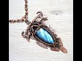 Wire-wrapped pendant with blue Labradorite. Vikings warrior.
