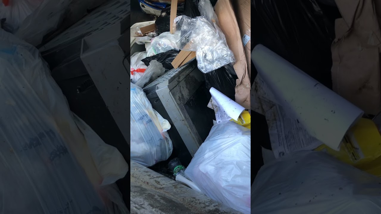 Garbage truck eats television 