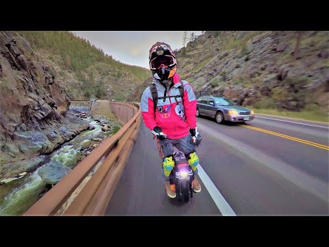 EUC or Electric Unicycle Fast Ride Busy Road