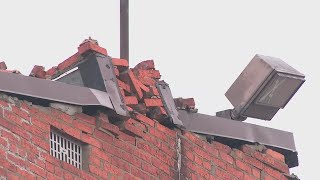 Olde Town East building deemed safe after chimney collapsed during wind event Saturday