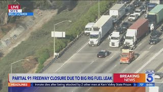 91 Fwy partially closed due to fuel spill