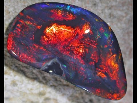 Ja mønster studieafgift Black Opal 'Glowing Embers' cut from rough to a polished stone - YouTube
