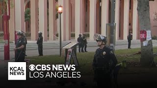 LAPD officers in riot gear clear pro-Palestine encampment at USC