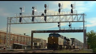 Big Train Goes Under Twin  CSX Signal Towers