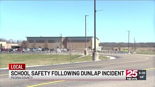 A Dunlap teen arrested for bringing a gun to school